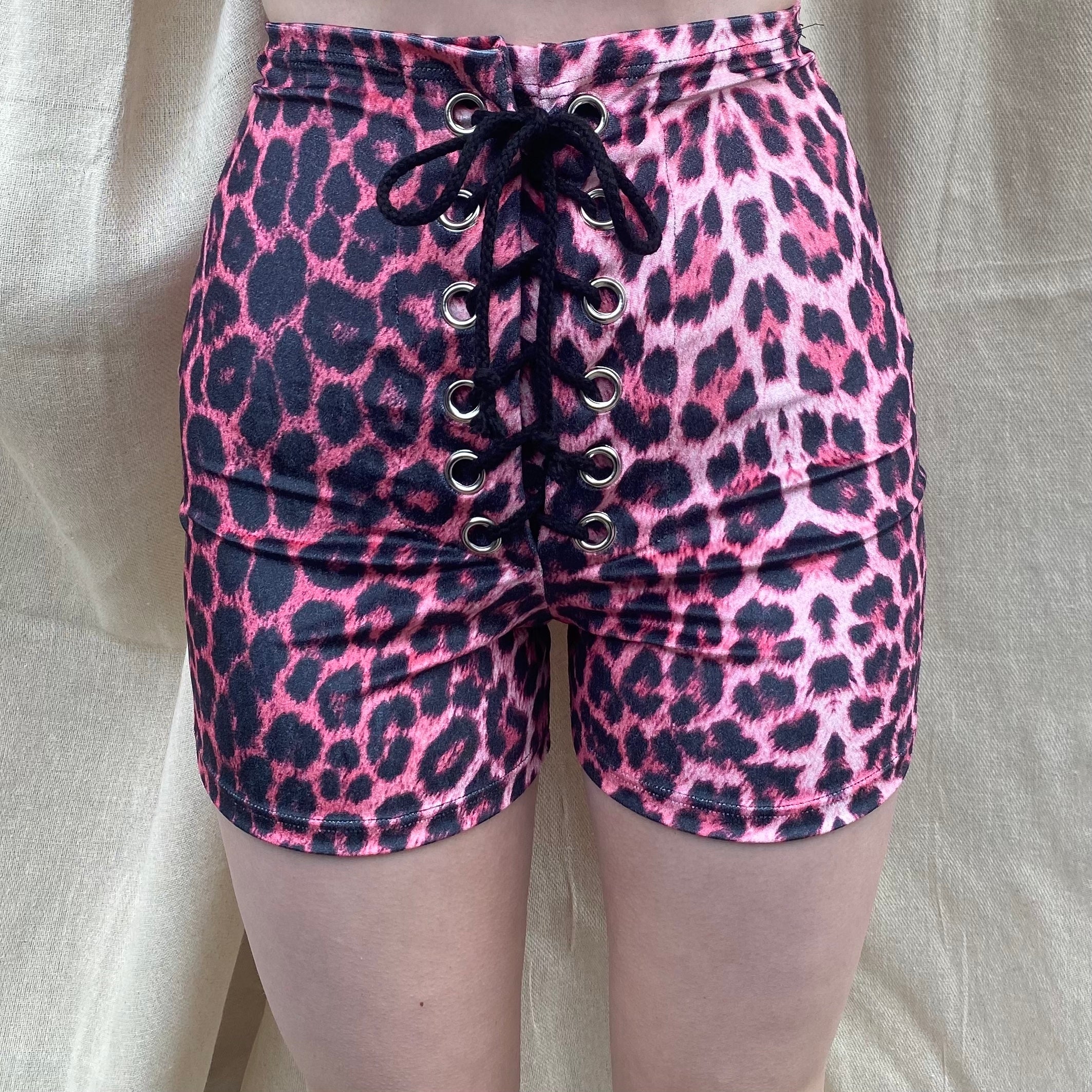 Pink leopard print shorts on sale